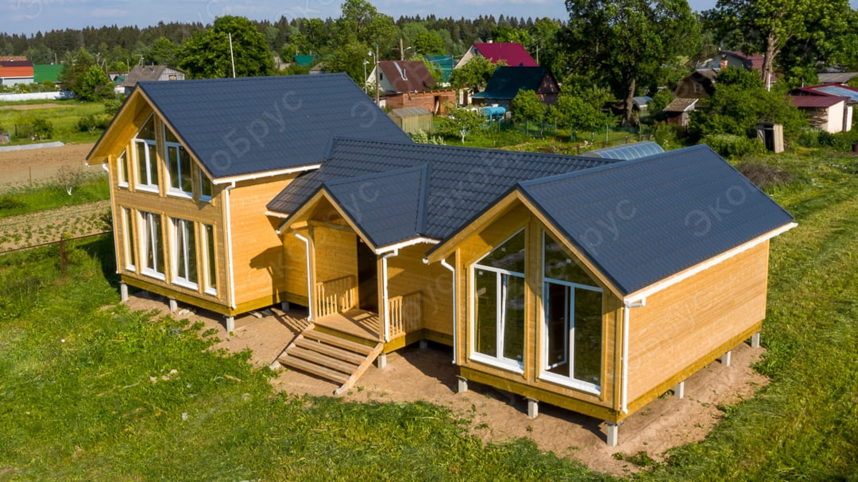 Каркасный дом 8 на 18 м фото снаружи. Строительство по проекту Ладога 2020 Д-5 фото №5